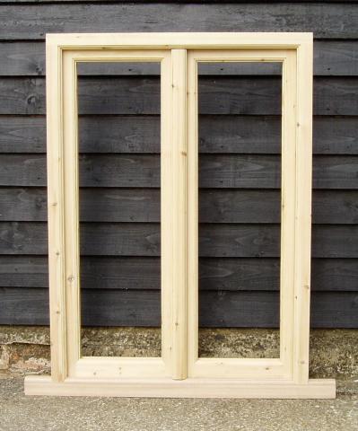 Storm proof window with fly mullion